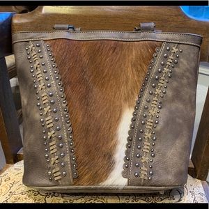 Cowhide concealed carry purse